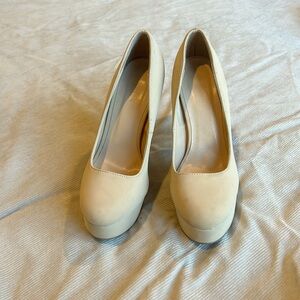 Tan high heel pumps